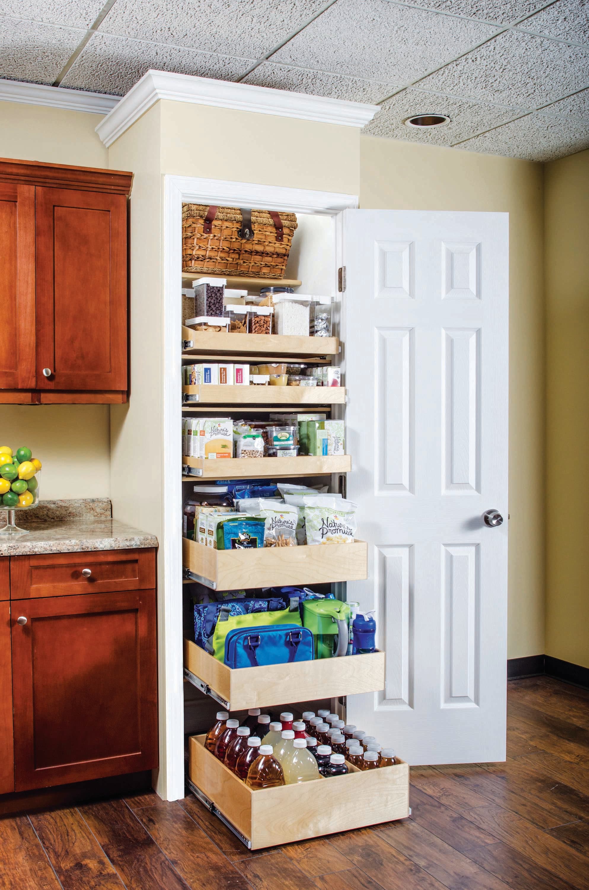 Pantry with custom pull-out shelving system
