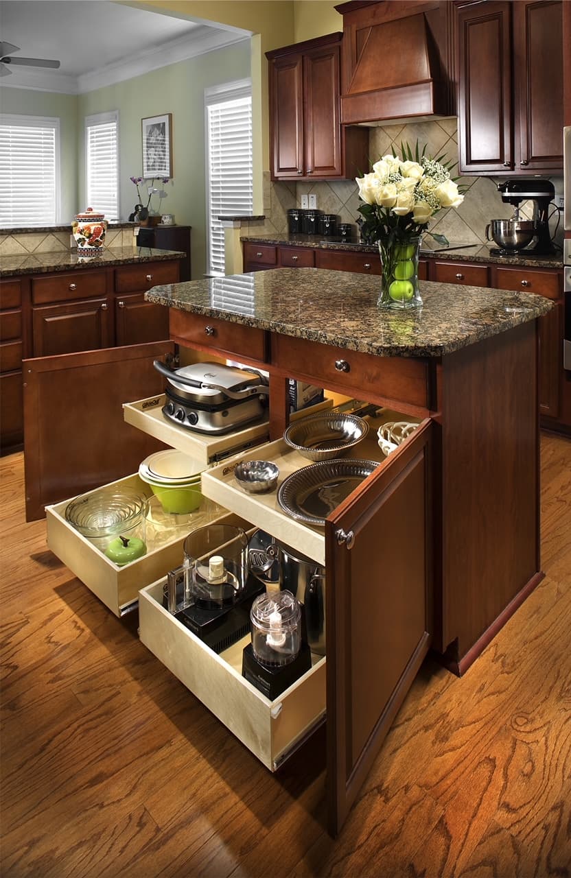 Kitchen island with pull-out shelf solutions