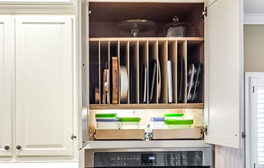 Overhead cabinet with divider shelves