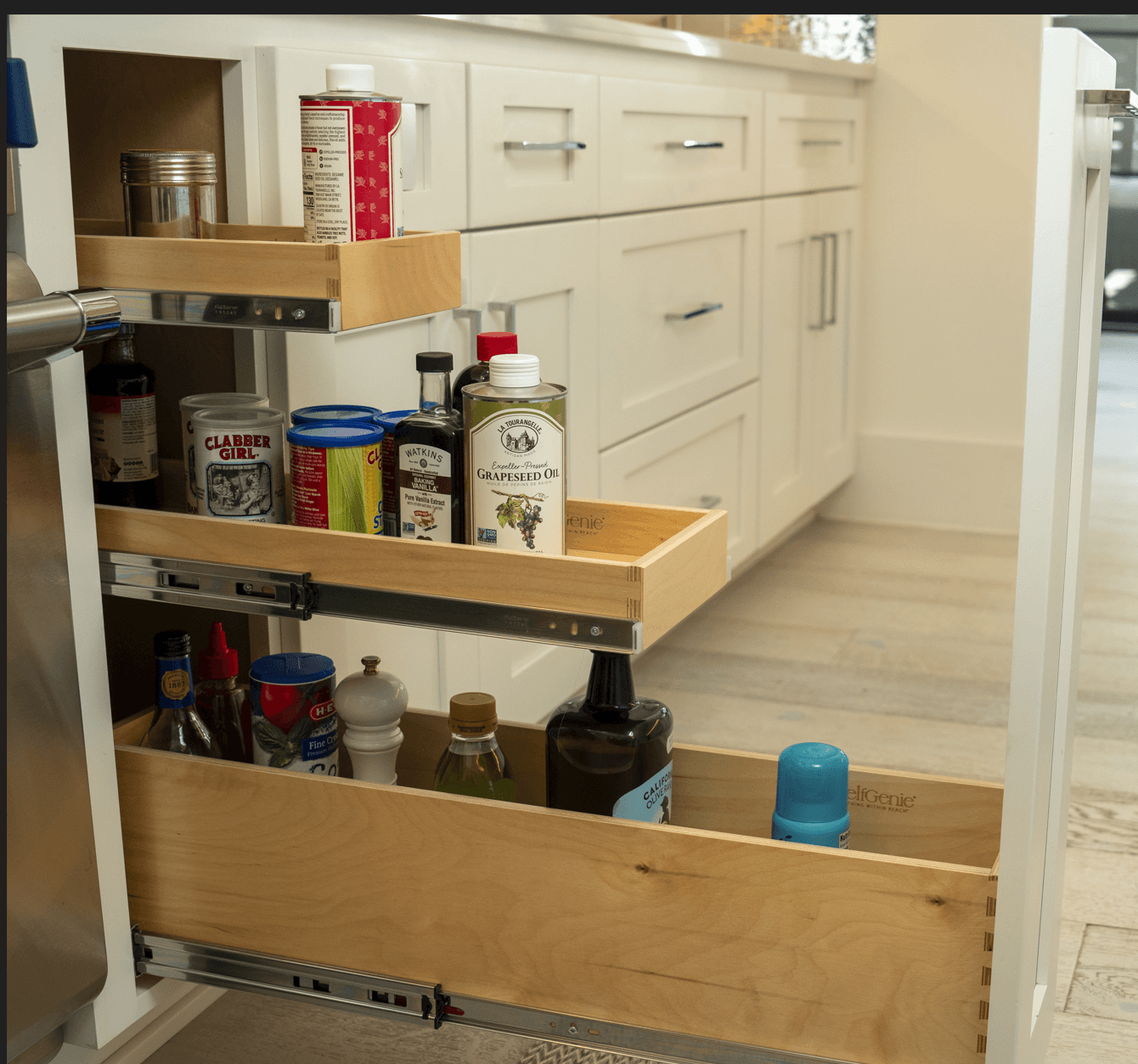 Pull-out spice rack with labeled spices